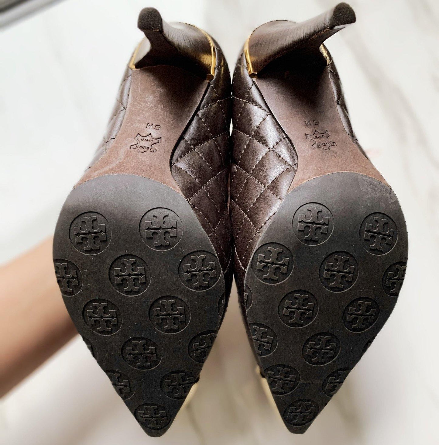Authentic chocolate brown quilted leather Tory Burch heels Almost, if not, brand new condition! No wear on outside sole atTory Burch gold toe,  heel chocolate brown quilted leather Size 6